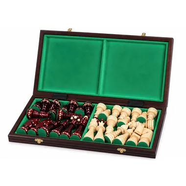 Coffret pliable ouvert avec pièces rouges et naturelles rangées dans le feutre
