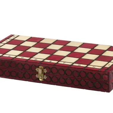 Échiquier pliable fermé en coffret, rouge et ivoire avec fermoir doré